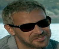 Nejat Isler as Escrument Cozer in Behzat C